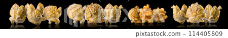 Set of popped popcorn on a black background Set of popped popcorn on a black background 114405809