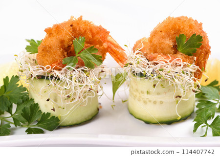 Cucumber and shrimp appetizer 114407742