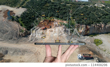 aerial view shot mining, dumpers, quarrying extractive industry stripping work. Big Mining Trucks. View from drone at opencast mining with lots of machinery trucks. High quality photo aerial view shot mining, dumpers, quarrying extractive industry stripping work. Big Mining Trucks. View from drone at opencast mining with lots of machinery trucks. High quality photo 114408206