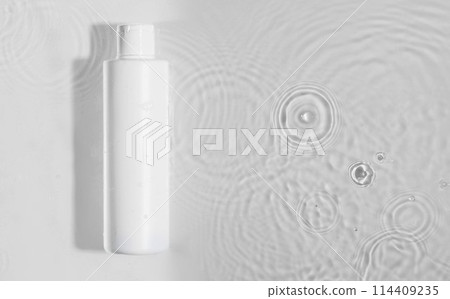 Cosmetic moisturizer with hyaluronic acid, micellar emulsion on white water background with splashes. Mockup of cosmetic packaging Cosmetic moisturizer with hyaluronic acid, micellar emulsion on white water background with splashes. Mockup of cosmetic packaging 114409235
