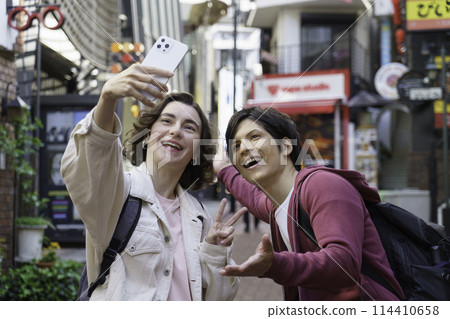 Inbound: Foreign couple taking a selfie on Spain Hill in Shibuya Inbound: Foreign couple taking a selfie on Spain Hill in Shibuya 114410658
