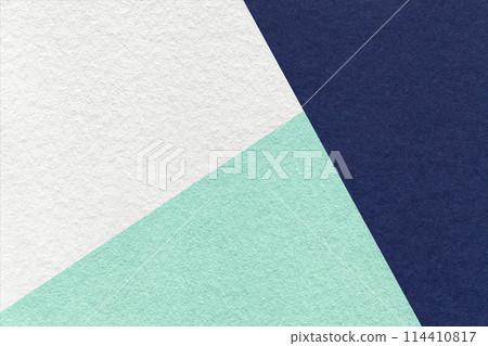 Texture of craft white, navy blue and cyan shade color paper background, macro. Vintage abstract mint cardboard 114410817