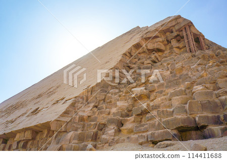 The crumbling side of the pyramid 114411688