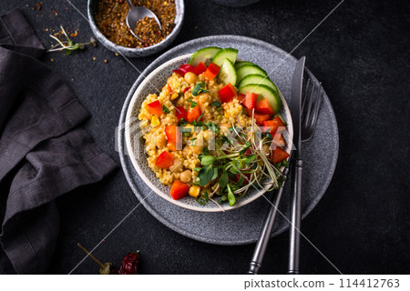 Bulgur with chickpeas and vegetables 114412763