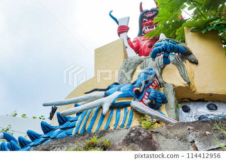 Demon and dragon statues encountered during a tour of Jigoku Onsen Demon and dragon statues encountered during a tour of Jigoku Onsen 114412956