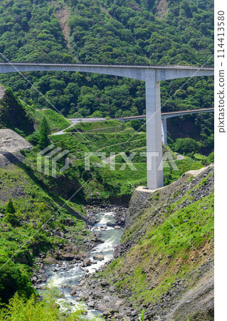 Panoramic view of Shin-Aso Bridge with clear spring skies and fresh greenery in the background (Minamiaso) Panoramic view of Shin-Aso Bridge with clear spring skies and fresh greenery in the background (Minamiaso) 114413580