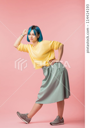 awesome young woman enjoying dancing awesome young woman enjoying dancing 114414193