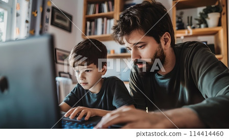 Focused Father and Son Using Laptop Together at Home. Family Bonding Over Technology. Casual Indoor Setting. Learning and Sharing Moments. AI 114414460