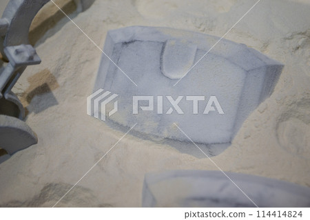 White polyamide powder and object on 3D printed from white polyamide powder close-up. Polyamide powder for creating objects on 3D printer. Additive MJF Multi Jet Fusion technologies. Thermoplastic White polyamide powder and object on 3D printed from white polyamide powder close-up. Polyamide powder for creating objects on 3D printer. Additive MJF Multi Jet Fusion technologies. Thermoplastic 114414824