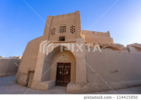 Ancient earthen buildings in the old town of Yazd, Iran. 114415950