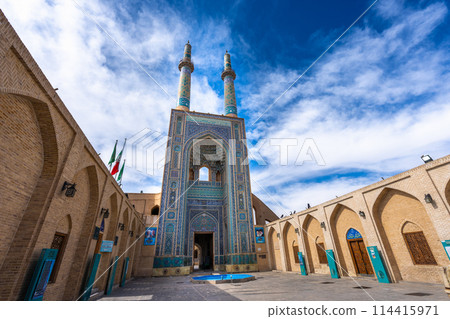 Beautiful Islamic artwork at the entrance to the Jameh Mosque in Yazd, Iran. 114415971