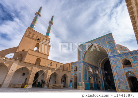 Beautiful Islamic artwork at the entrance to the Jameh Mosque in Yazd, Iran. 114415973