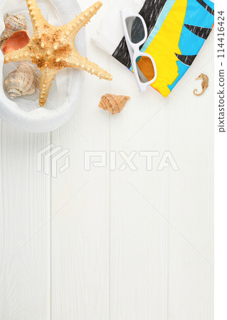 Beachwear and clam souvenirs banner. 114416424