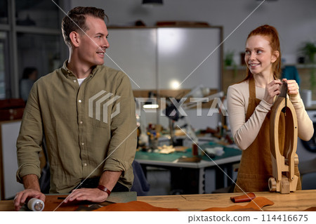 young couple flirts, smiling to each other 114416675