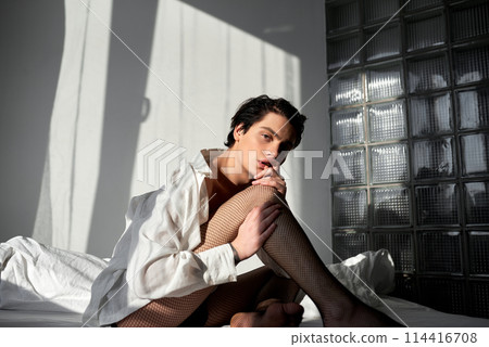 hot sexy charismatic guy looks at camera hot sexy charismatic guy looks at camera 114416708