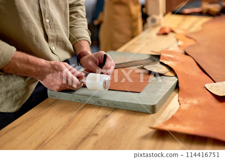 man's arms working with Mauls and Pricking Irons man's arms working with Mauls and Pricking Irons 114416751