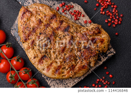 Delicious juicy pork steak with salt, spices and herbs Delicious juicy pork steak with salt, spices and herbs 114416846