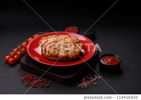 Delicious juicy turkey or chicken steak with salt, spices and herbs 114416920