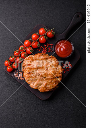 Delicious juicy turkey or chicken steak with salt, spices and herbs Delicious juicy turkey or chicken steak with salt, spices and herbs 114416942