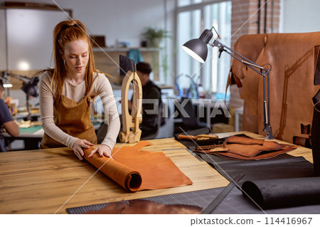 young pretty prepare natural material for work 114416967