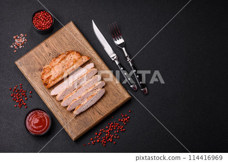 Delicious juicy turkey or chicken steak with salt, spices and herbs Delicious juicy turkey or chicken steak with salt, spices and herbs 114416969