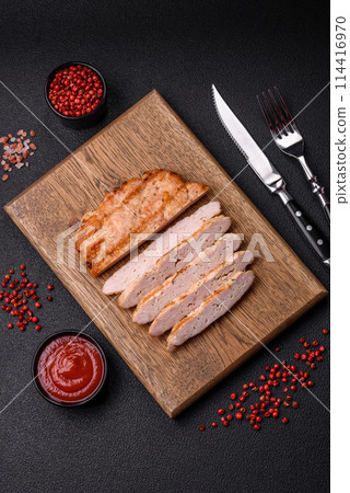 Delicious juicy turkey or chicken steak with salt, spices and herbs Delicious juicy turkey or chicken steak with salt, spices and herbs 114416970