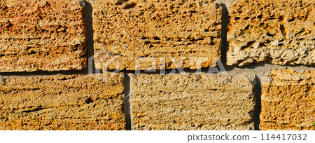 Ashlar stone, wall texture background. Wide photo. 114417032