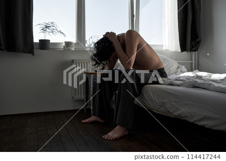 young man has serious problems in business Withdrawal 114417244