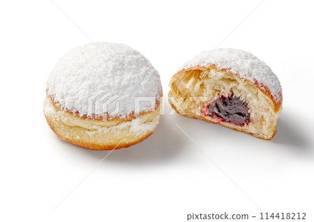 Sweet doughnuts with currant filling and powdered sugar Sweet doughnuts with currant filling and powdered sugar 114418212