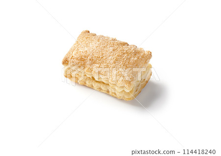 Crispy cream puff pastry sprinkled with sugar on white background 114418240