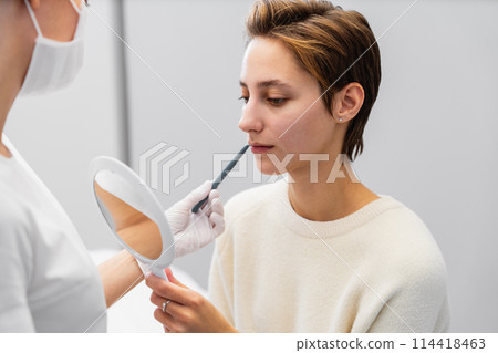 Consultation with a cosmetologist. Contour plastic. Consultation with a cosmetologist. Contour plastic. 114418463