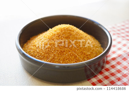 Brown sugar on white background 114418686