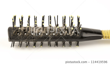 Brush with full hair. Hair on the brush, hair loss problem. 114419596