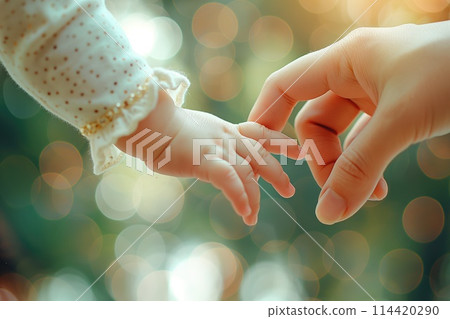 baby's tiny hand hugs mommy's finger baby's tiny hand hugs mommy's finger 114420290