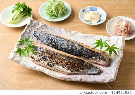 Seared bonito caught on a fence Seared bonito caught on a fence 114421925