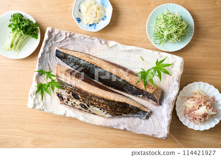 Seared bonito caught on a fence Seared bonito caught on a fence 114421927