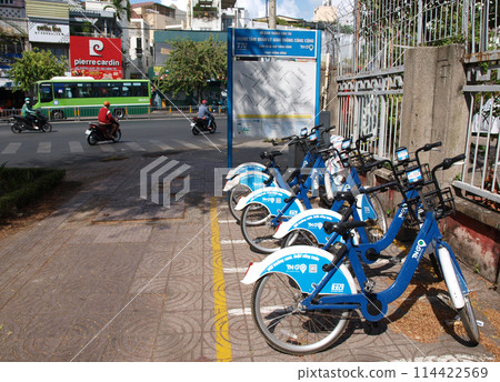 Blue rental bicycles in Ho Chi Minh City, Vietnam Blue rental bicycles in Ho Chi Minh City, Vietnam 114422569