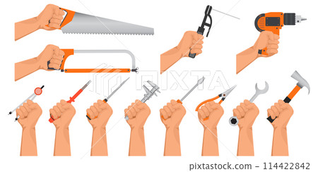 Hands holding construction tools. 114422842