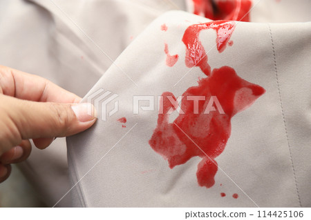 Dirty jam stain food on pant from eating. stain for cleaning concept Dirty jam stain food on pant from eating. stain for cleaning concept 114425106