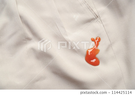 Dirty jam stain food on pant from eating. stain for cleaning concept Dirty jam stain food on pant from eating. stain for cleaning concept 114425114