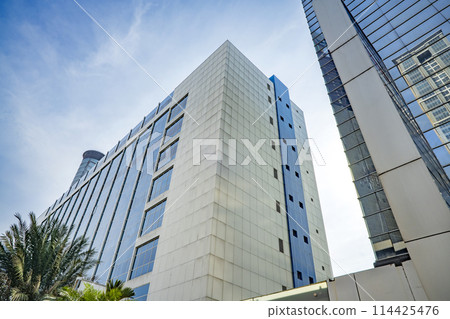Skyscrapers and office building with blue sky 114425476