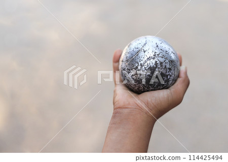 Kid hand hold in playing sport in free time for learning Kid hand hold in playing sport in free time for learning 114425494