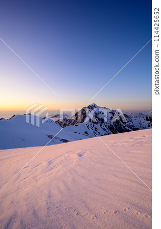 Mt. Tsurugi illuminated by the setting sun 114425652