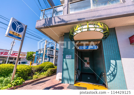 Yokohama cityscape in Japan. View of Odoriba Station Entrance 4 of the Yokohama Municipal Subway. A cat... = May 10th 114429125
