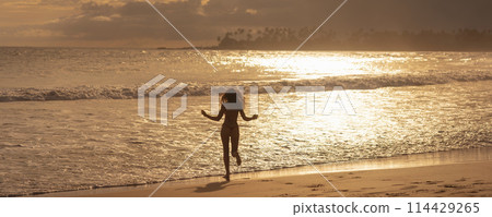 Carefree Running Bikini Beach Woman Near Ocean During Summer Vaacation Carefree Running Bikini Beach Woman Near Ocean During Summer Vaacation 114429265