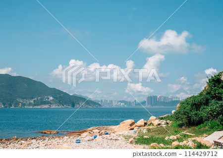 Shek O Tai Tau Chau beach and city view in Hong Kong 114429712