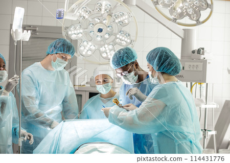 doctors spending time in the operating room 114431776