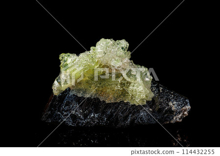 Macro stone Hyalite mineral, tourmaline Sherl, smoky quartz on a black background 114432255