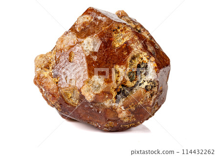 Macro stone Grossular mineral on white background Macro stone Grossular mineral on white background 114432262