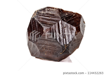 Macro stone Grossular mineral on white background 114432263